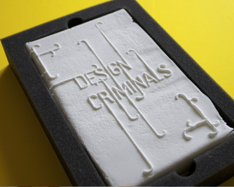 Edible Design Criminals catalogue with embossed sugar cover