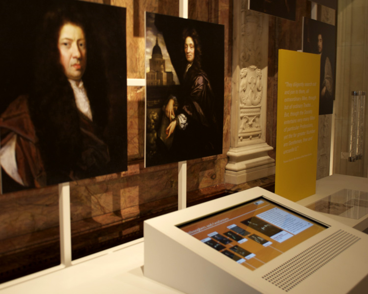 Royal Society 350th anniversary exhibition with interactive table and historic portraits
